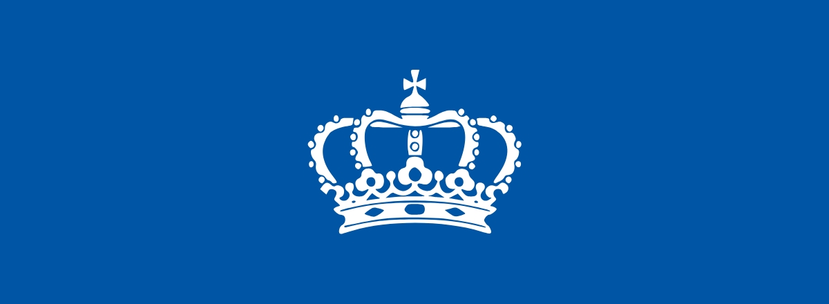 Kings crown on blue solid background