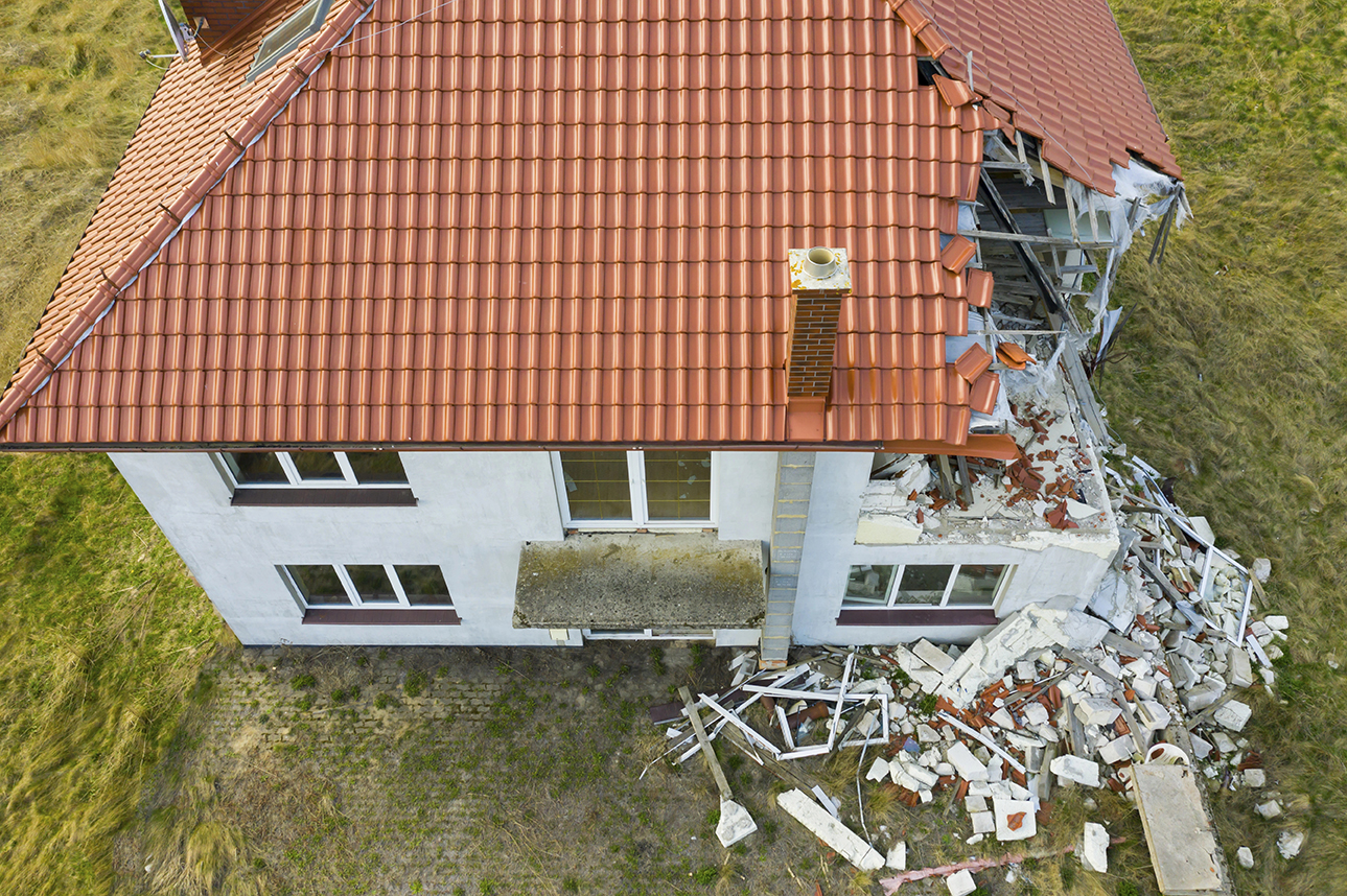 Roof of property damaged by storm
