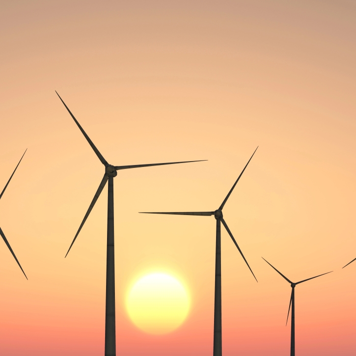 Wind turbines on a sunset